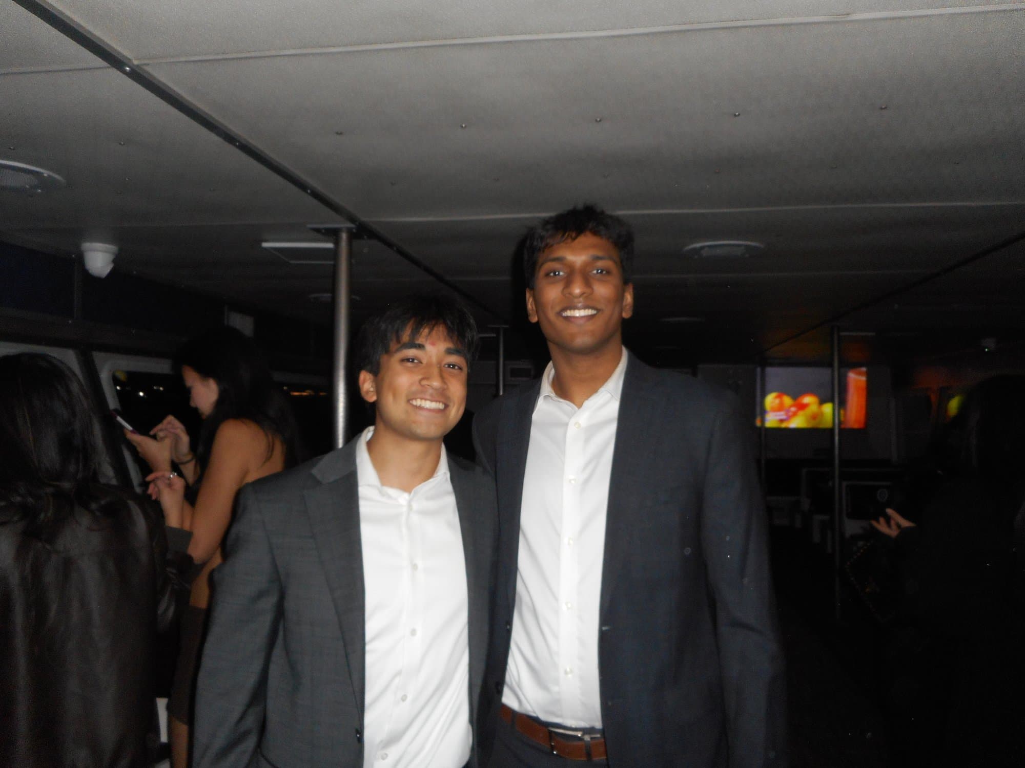 Two brothers below deck at formal